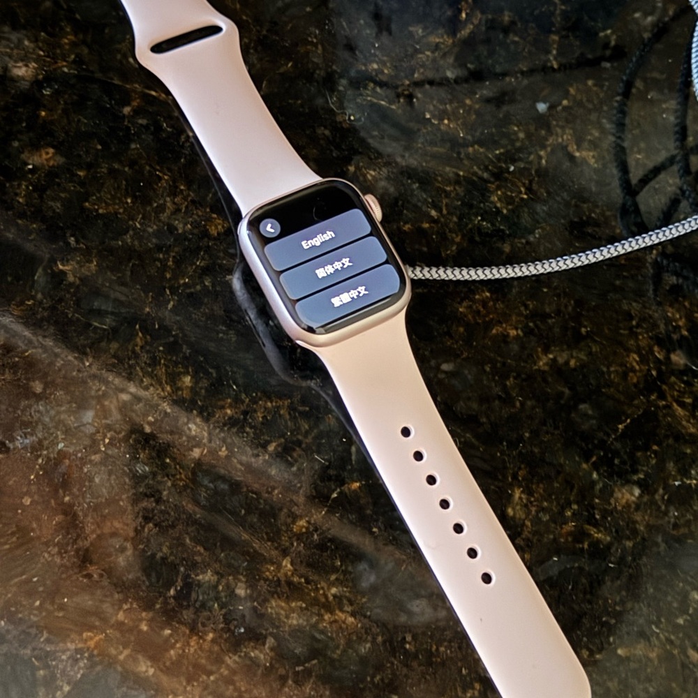 Apple Watch series 8 with Pink hardware and Band